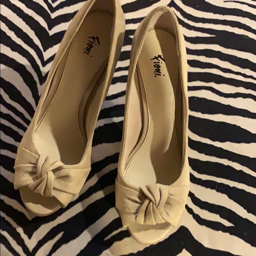 Nude suede heels.